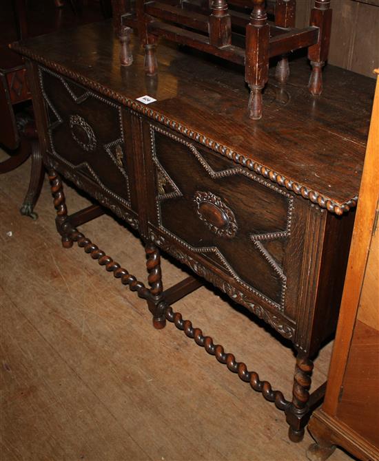 A Jacobean Revival oak side cabinet, W.4ft 1in.